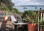 Waiheke Beach Barn: View from deck over Rocky Bay