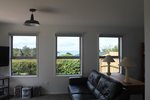 Waiheke Bayview Bungalow (Guest Suite): Lounge with bunks in suite