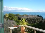 Waiheke Beach Barn: View from deck overlooking Rocky bay